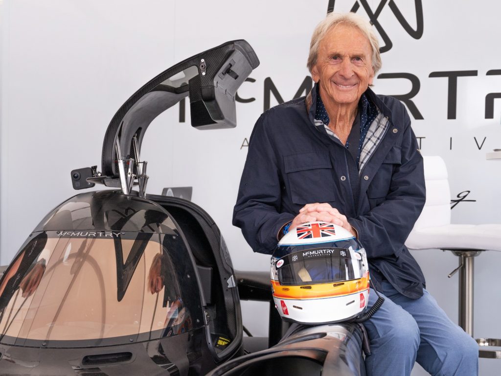 Derek Bell poses with the McMurtry Spéirling at the Goodwood Festival of Speed