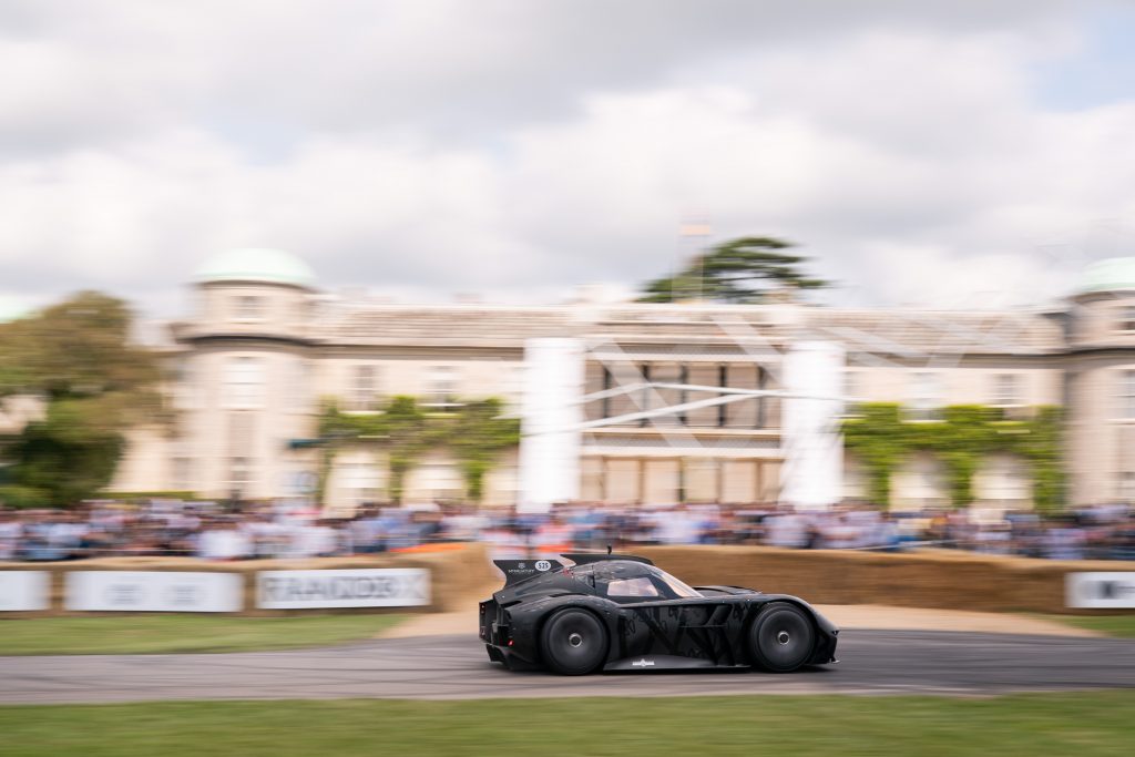 The McMurtry Spéirling flies past Goodwood House on its way up the Hillclimb at the Festival of Speed