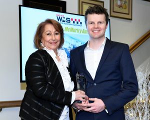 Thomas Yates, Managing Director of McMurtry Automotive collects RaceTech Dino Toso Aerodynamicist of the Year award on behalf of McMurtry Automotive from Soheila Kimberley of RaceTech